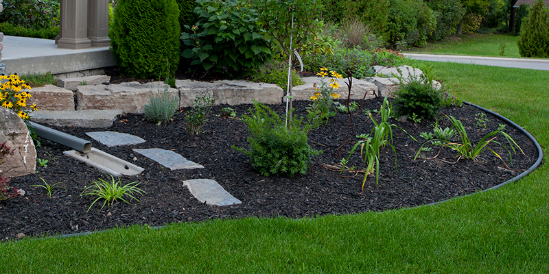 when to mulch flower beds