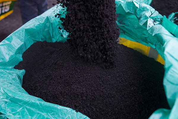 Filling Soil Bags with Black Garden Soil