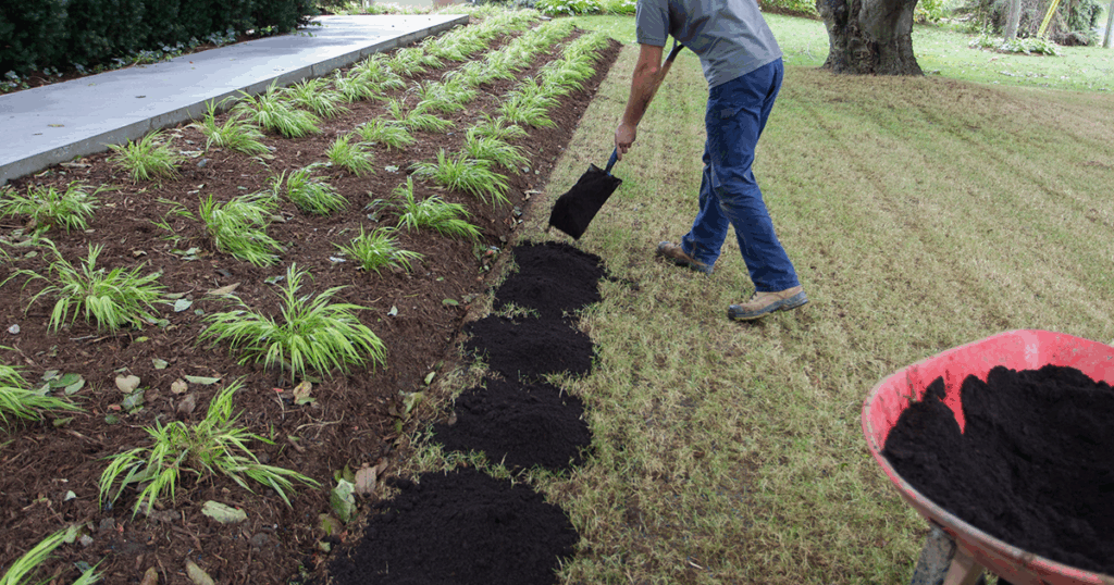 Spread BigYellowBag Black Garden Soil evenly across your entire lawn!